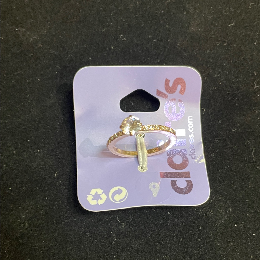 Claires Gold And Silver Ring With Sparkling Gem 8$